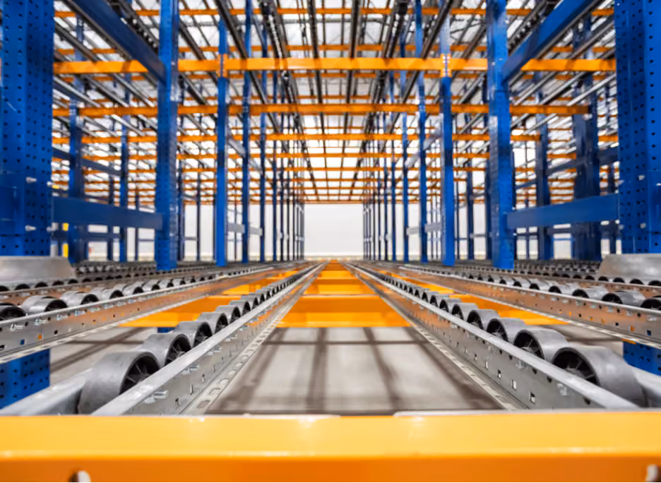 Large warehouse buildout with pallet racking and conveyor installation
