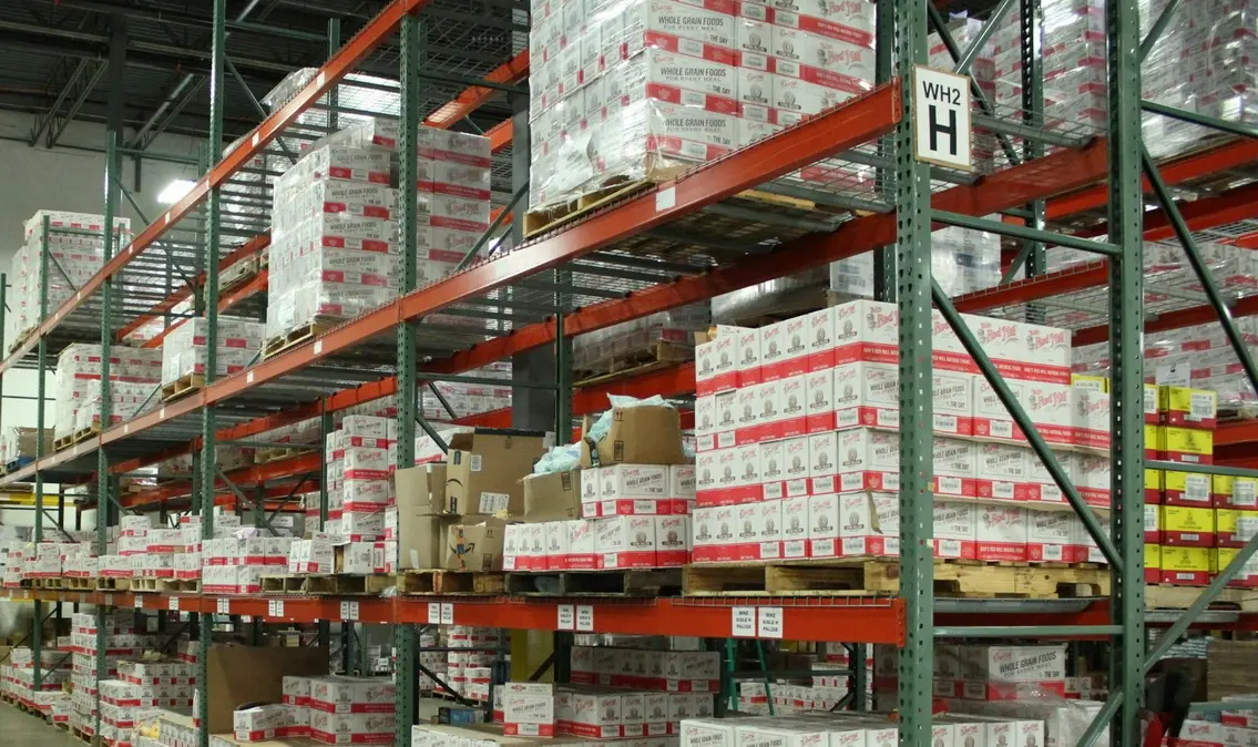 Complete warehouse rack labeling and identification system along a wide aisle