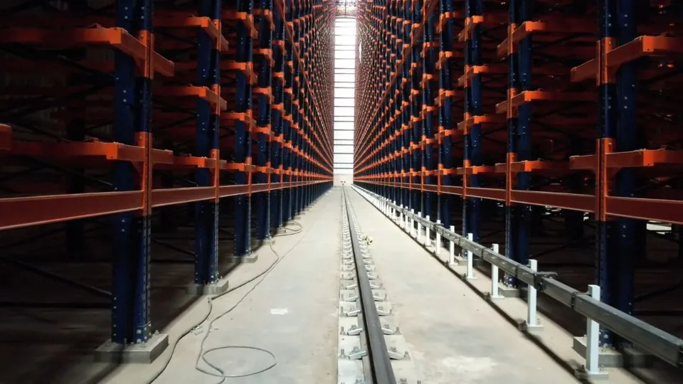 Interior of a modern warehouse with tall pallet racking